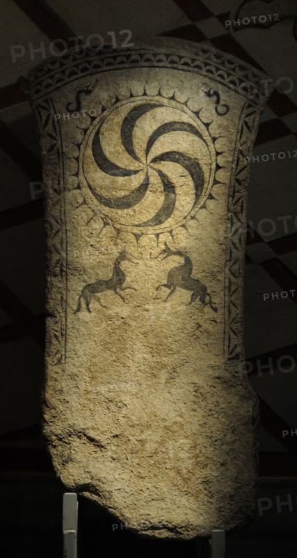 Petroglyph with whorl in the center.