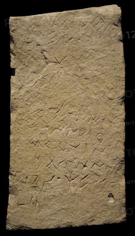 Tombstone with inscription