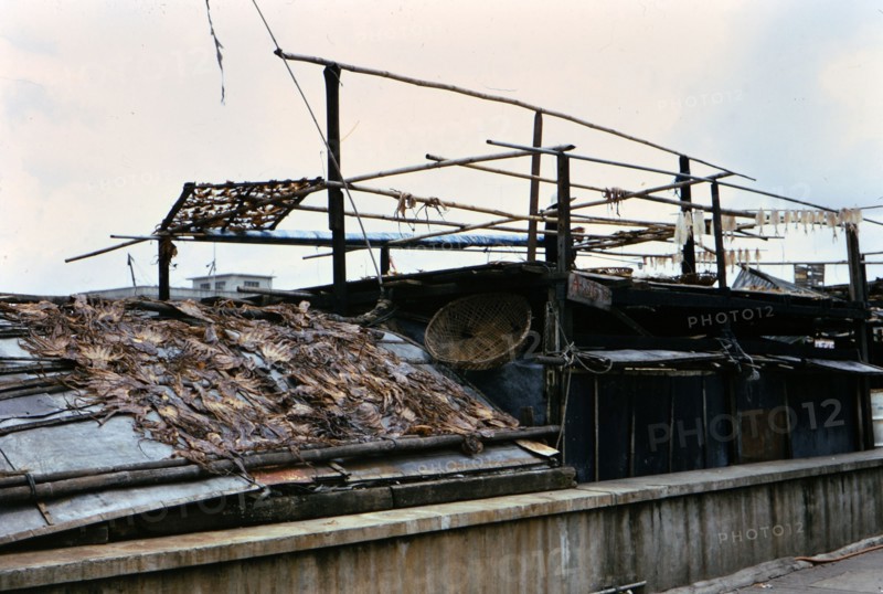 (R) 1973 - Drying seafood in Macau.