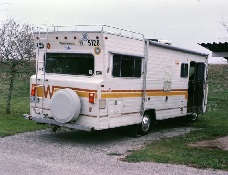 A Winnebago recreational vehicle parked at a campsite circa 1987.