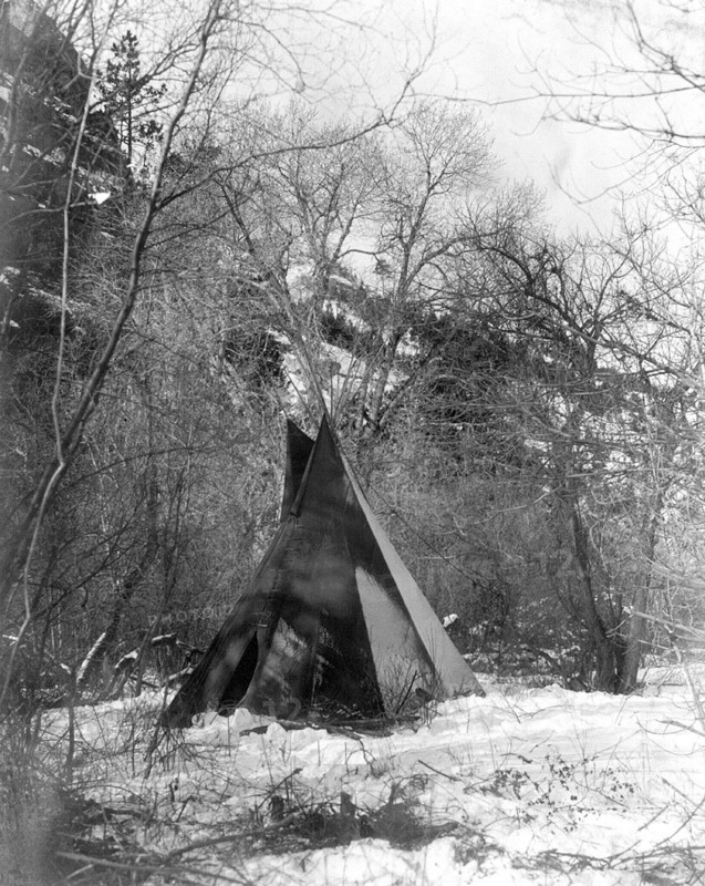 Edward S. Curtis Native American Indians - A Sioux Indian teepee in a winter camp circa 1908.