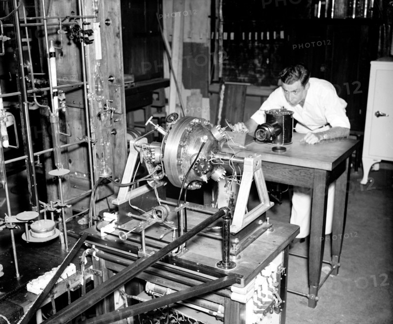 A study of the mechanism of the flame propogation in the cylinder of a internal combustion engine is being made at the U.S. Bureau of Standards for the National Advisory Committee for Aeronautics circa 1937 .