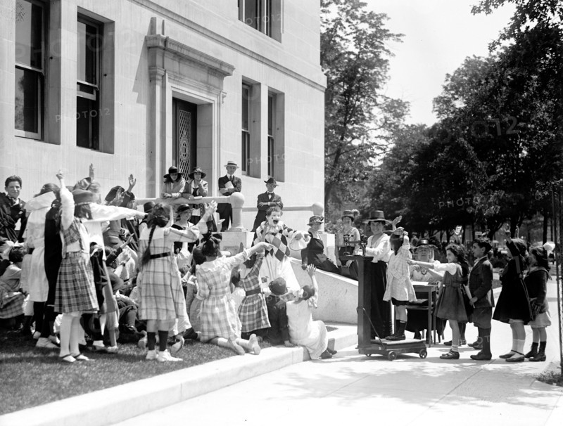 Cho-Cho, the Health Clown entertaining children circa 1919 .