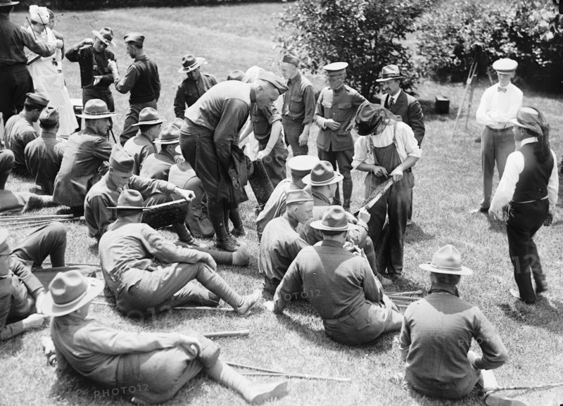 Beekeeping demonstration and instruction for wounded soldiers circa 1919 .