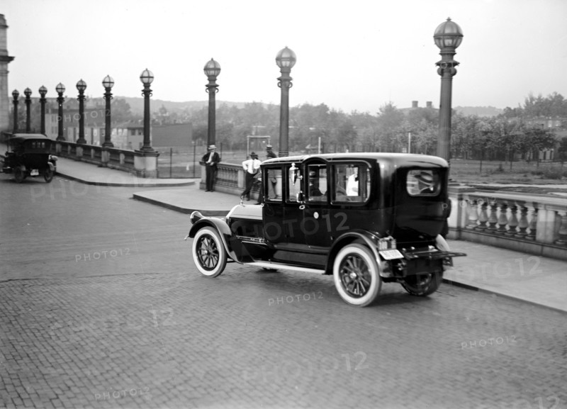 Car crossing a bridge in Washington D.C. circa 1919.