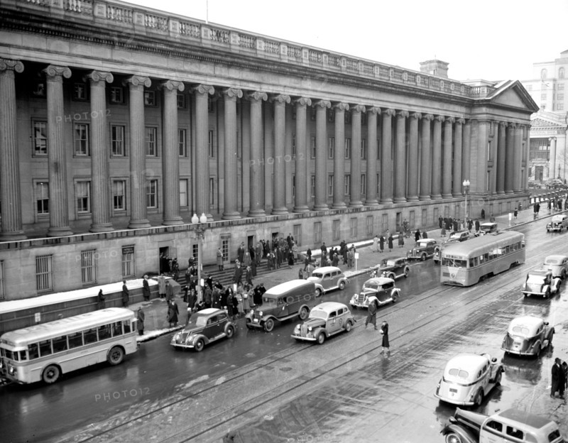 Cars, buses and pedestrians in Washington D.C. street scene circa 1938 or 1939 (15th Street) .
