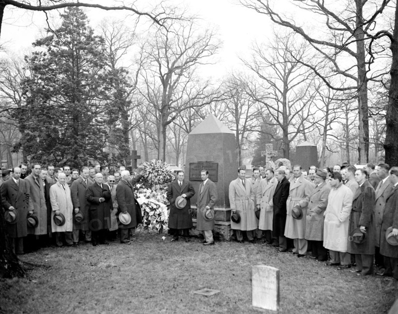 Baseball players, managers and President Roosevelt laying a wreath at the grave of baseball founder Abner Doubleday circa 1939.