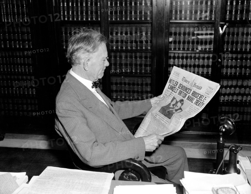 April 28, 1939 - Senator William Borah reads newspaper headlines on Adolf Hitler .
