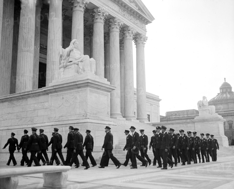 Supreme Court guard outside the Supreme Court Building circa 1936.