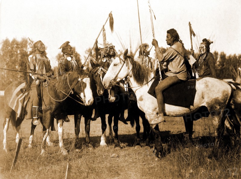 Edward S. Curtis Native American Indians - Six Crow Indians in full regalia, on horseback, Montana circa 1908.