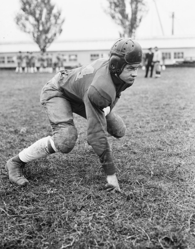 Otis Cole plays guard on the Navy team. 10/24/35.