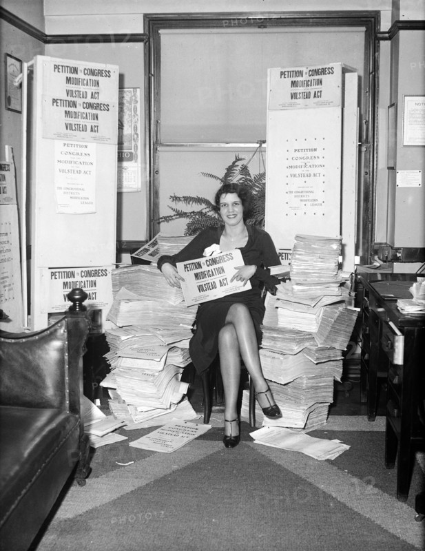 Woman with signs: Petition to Congress Modification, Volstead Act circa 1932.