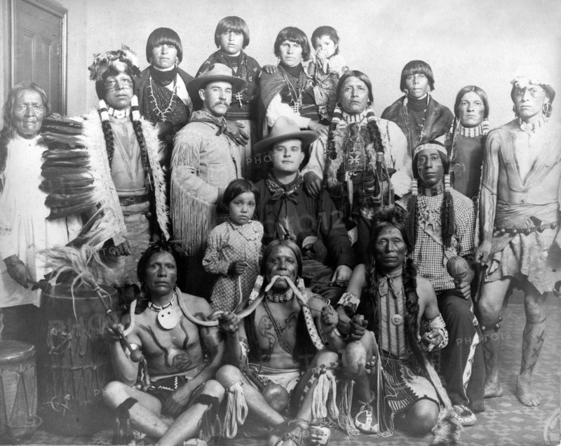 Edward S. Curtis Native American Indians - Group of Pueblo Indians, three men in front holding snakes, two Caucasian men in center circa 1905.