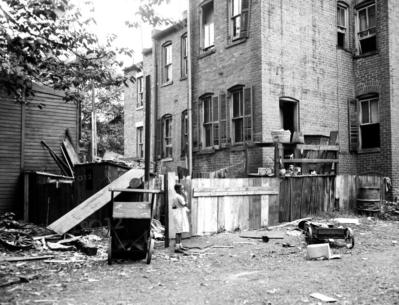 Slums in the ghetto of a large American city (possibly Washington D.C.) circa 1935.