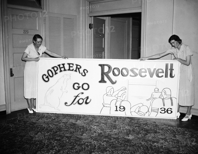 Two women holding a Gophers go for Roosevelt sign circa 1936.