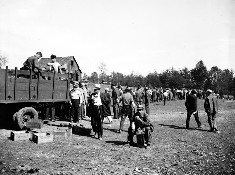 Workers at Tugwelltown (Greenbelt Maryland) take a lunch break circa October 1935.
