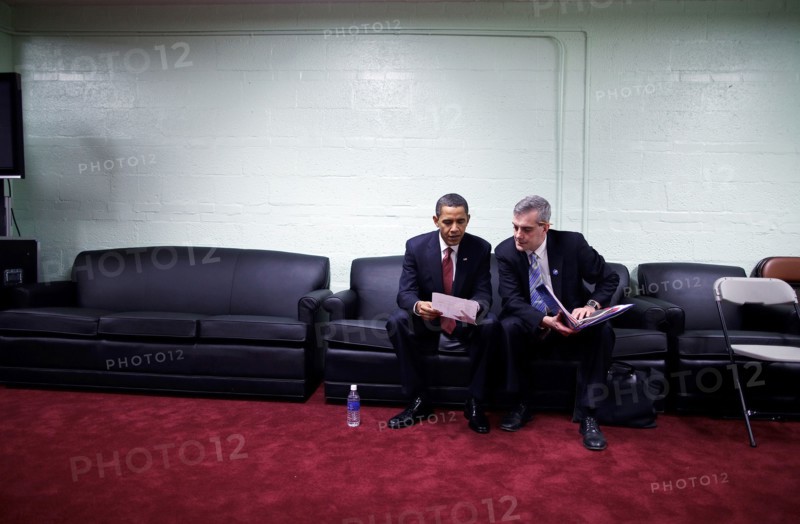Following a policy speech on Iraq at Camp Lejeune, North Carolina, President Barack Obama is briefed by Denis McDonough, Deputy National Security Advisor,  before a TV interview 2/27/09. .