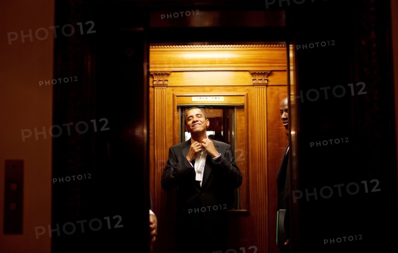 Early in the morning on Jan. 21st, President Barack Obama rides the elevator to the Private Residence of the White House after attending 10 inaugural balls and a long day including being sworn in as President at noon on Tuesday, Jan. 20, 2009.  .