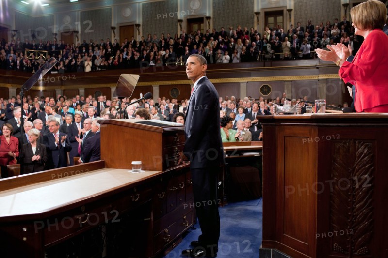 President Barack Obama looks towards the First Lady and guests seated in the gallery of the House Chamber at the U.S. Capitol in Washington, D.C., Sept. 9, 2009..