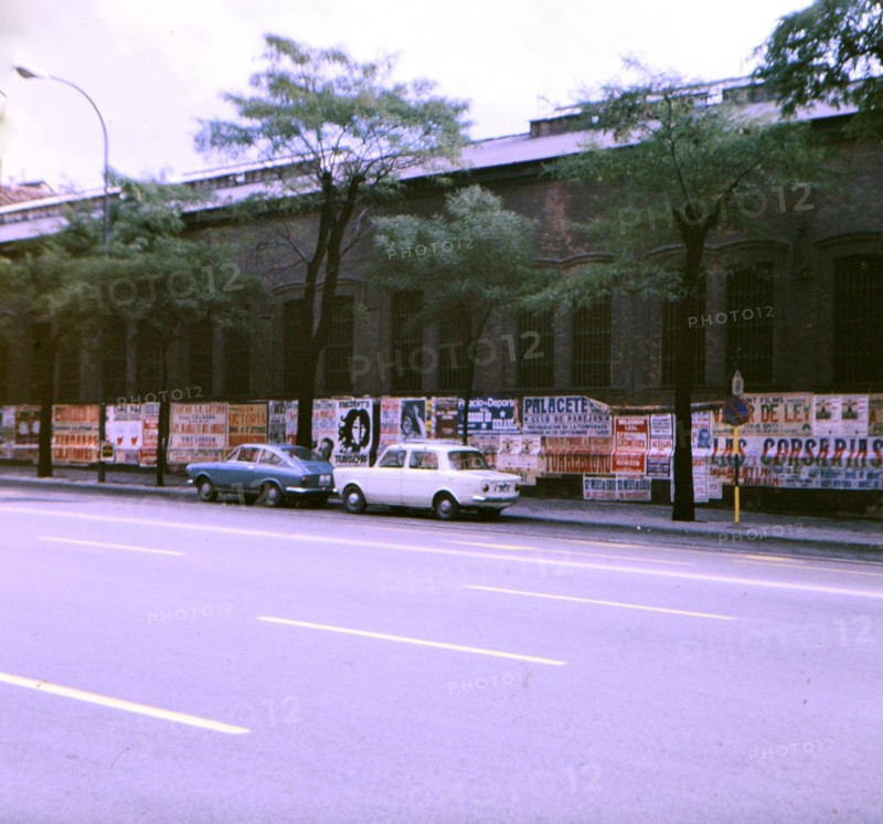 Cars parked along a road in Madrid circa 1969.