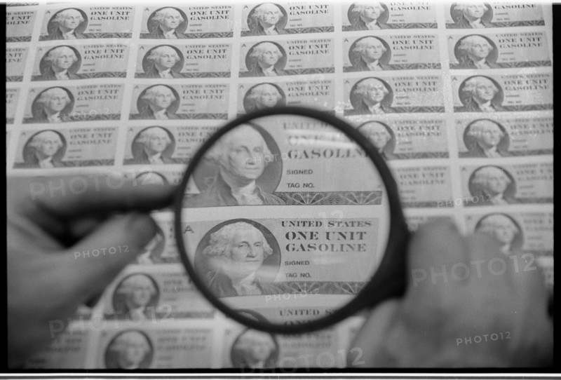 Gasoline Rationing Stamps Being Inspected, 1974