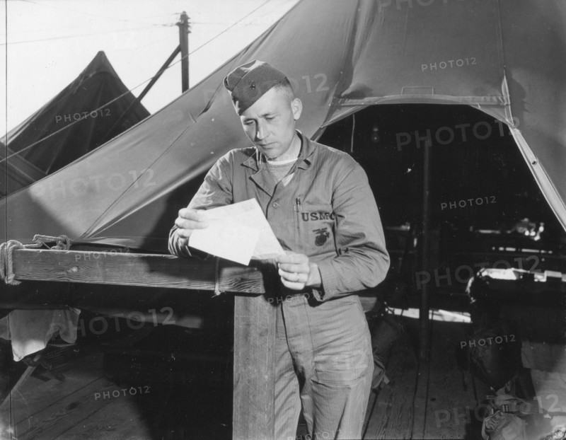 Marine reading letter from home
