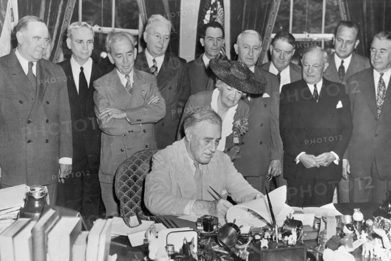 President Franklin Roosevelt signs GI Bill of Rights 1944.