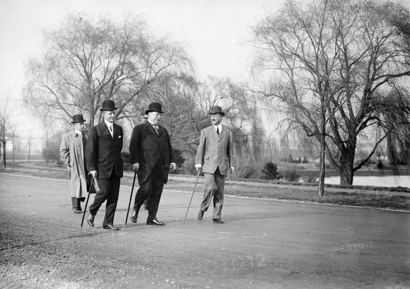 President William Howard Taft walking with Archibald Butt and Charles Dewey Hilles