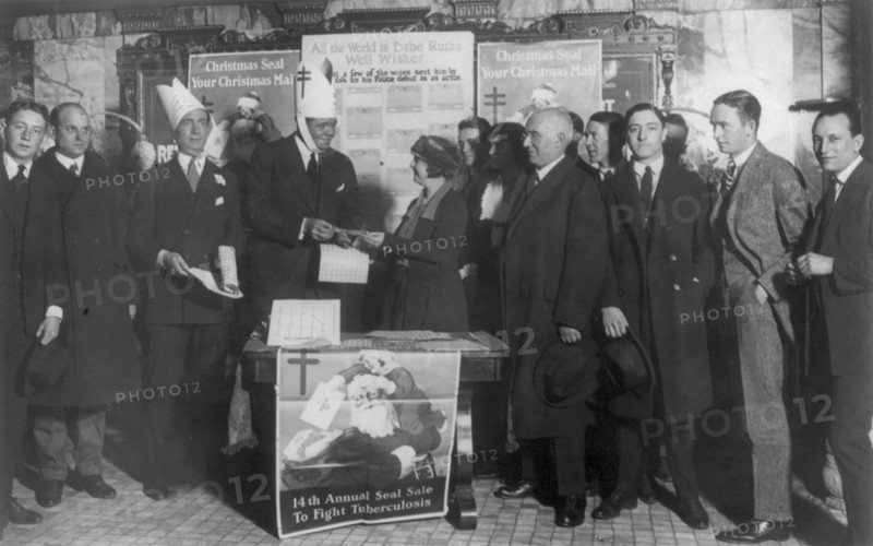 Babe Ruth selling Tubercular Christmans Seals in the lobby of Keiths Theater