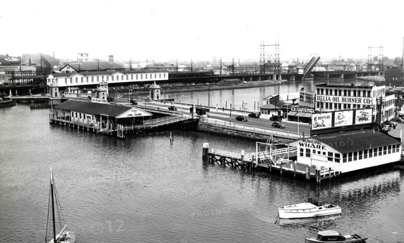 This photograph depicts a low aerial view of the wharves
