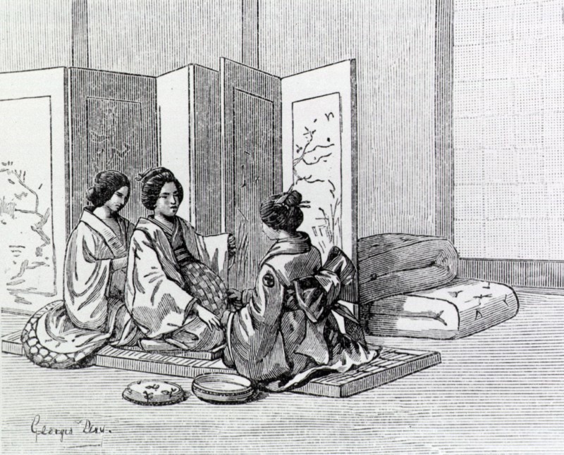 Two Japanese women attend to a woman in labor.