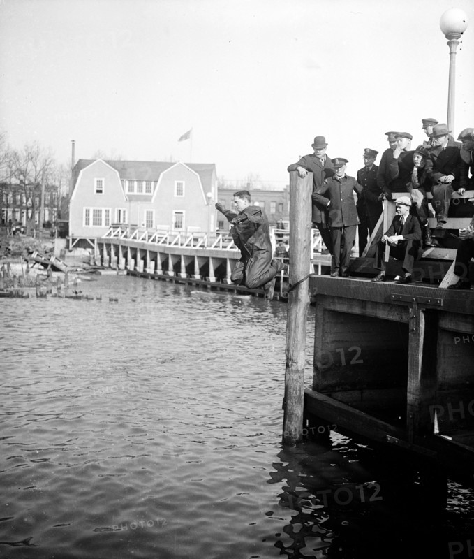 Man jumping off dock