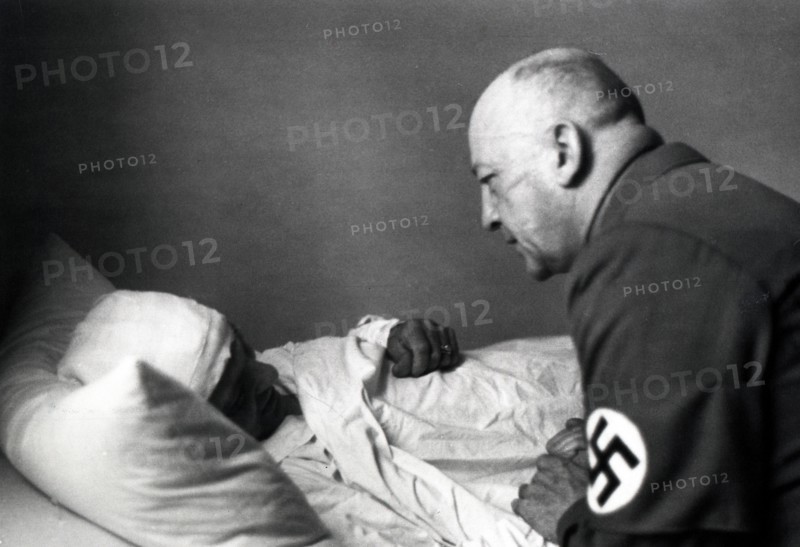 Wounded soldier in hospital after failed assasination attempt on Adolf Hilter
