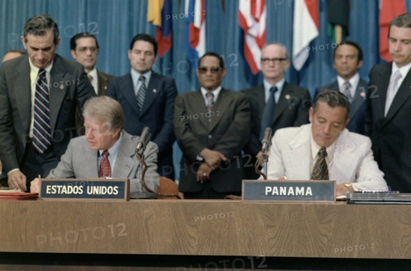 Jimmy Carter and Omar Torrijos signing the Panama Canal Treaty.