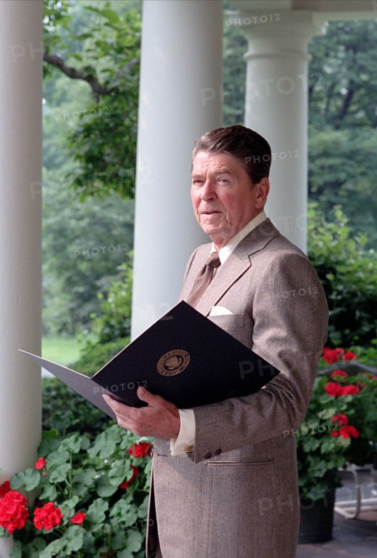 President Reagan reading.