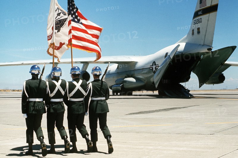 1977 - An Army color guard marches out