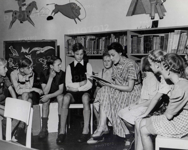 Reading to Children, Germany ca. August 1950