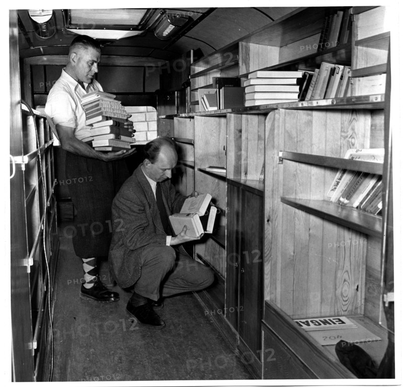 Returning Books to their Places Inside the Bookmobile