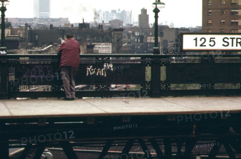 Man standing on 125th Street Elevated Train Platform