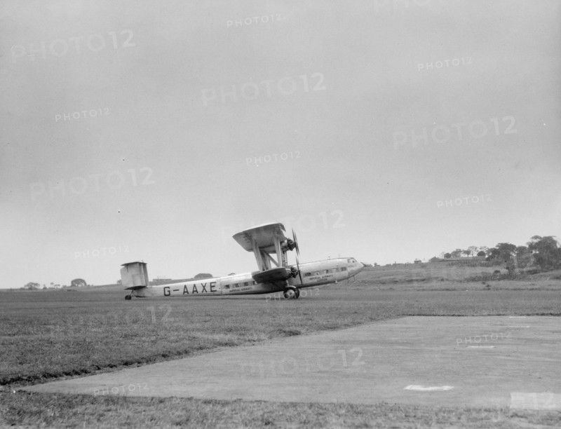 Handley Page H.P. 42 or H.P. 45 Airplane taking off at an airport in Uganda ca. 1936