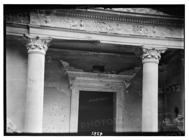 Elaborate consoled cornice. Above lintel of main doorway in Petra, El-Khazneh ca. 1920