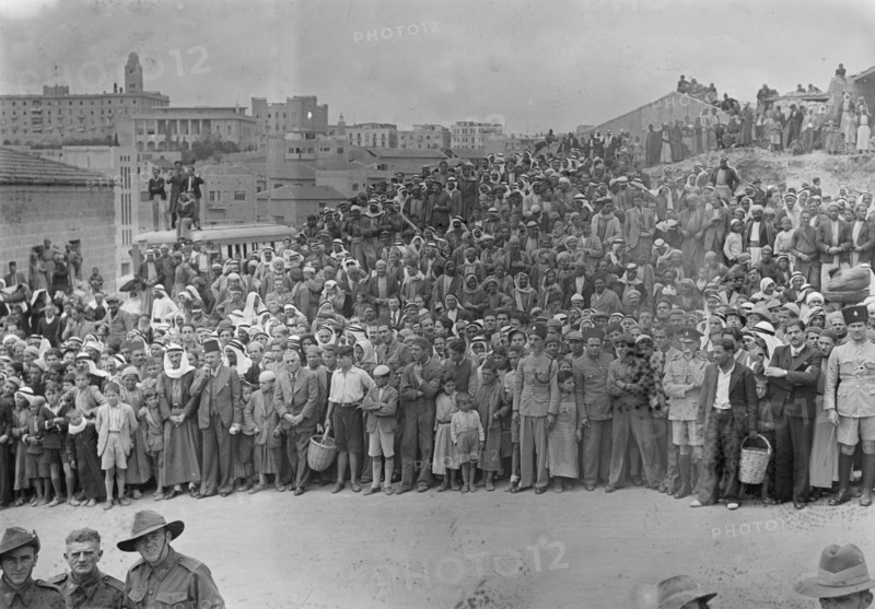 Arab recruits on parade in Jerusalem. Crowd of spectators. Arabs gathering watching parade ca. 1941