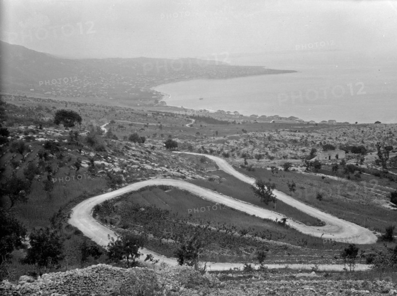Juneh and the bay showing zigzag ascent to Ghazir ca. 1920