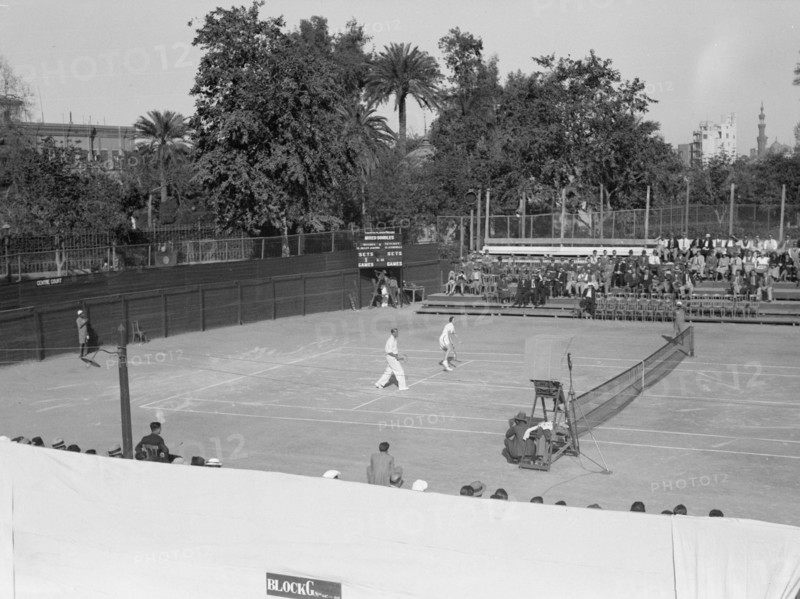 Gezira Gardens & Sports Club in Cairo Egypt, men playing on the tennis courts ca. between 1934 and 1939