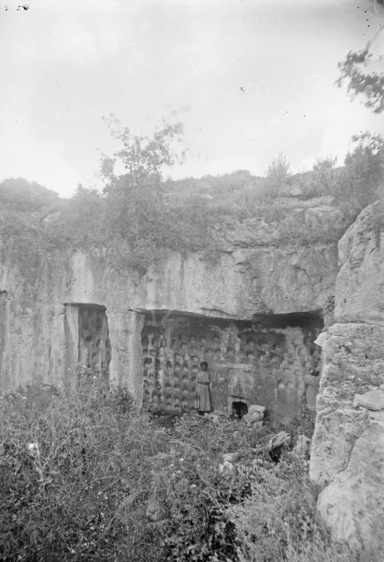 Man standing outside of Joshua's Tomb at Tibna (Kihrbet Tibna, Timnah) ca. 1900