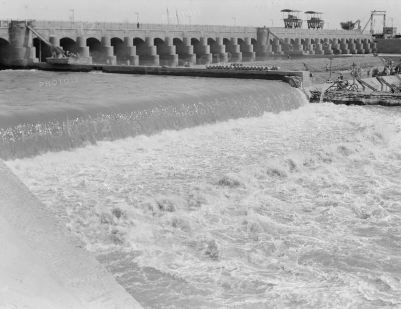 Hindiyah Barrage in Iraq, about 48 miles southeast of Baghdad. Foaming waters coming through the sluices ca. 1932