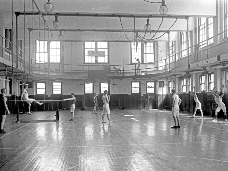Men working out in a YMCA gymnasium ca. 1910 to 1925
