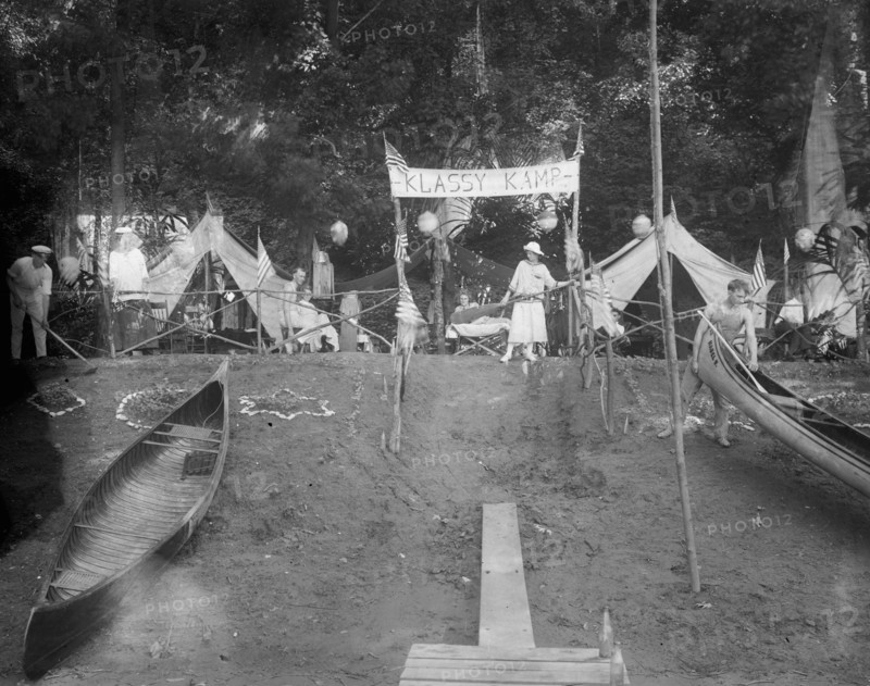 Summer camps: Campers at Klassy Kamp with canoes ca.  between 1910 and 1935