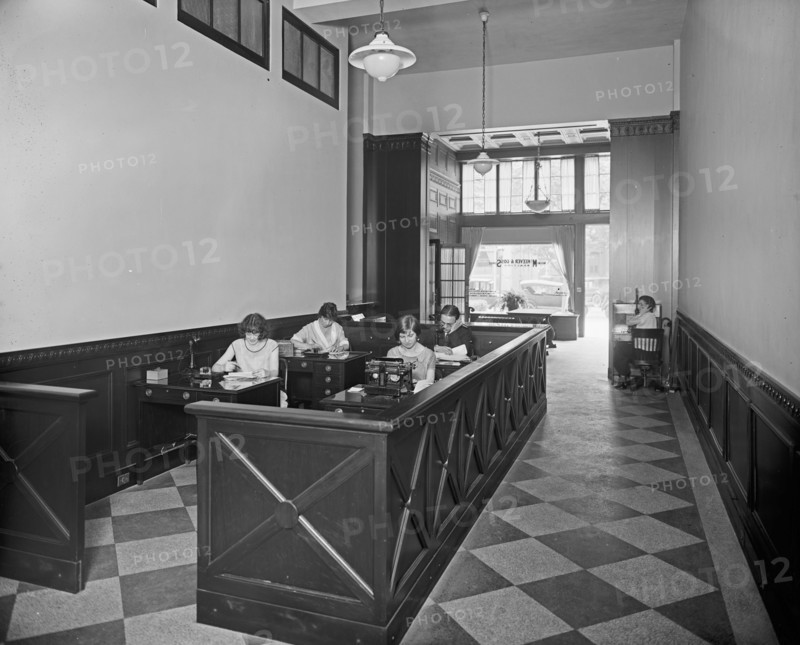 McKeever & Goss, woman working, interior Office ca.  between 1910 and 1935