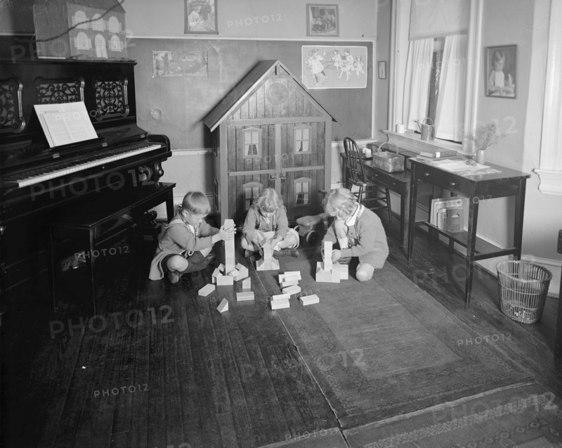 Mrs. Tomlin's school, young children playing with blocks ca.  between 1910 and 1920